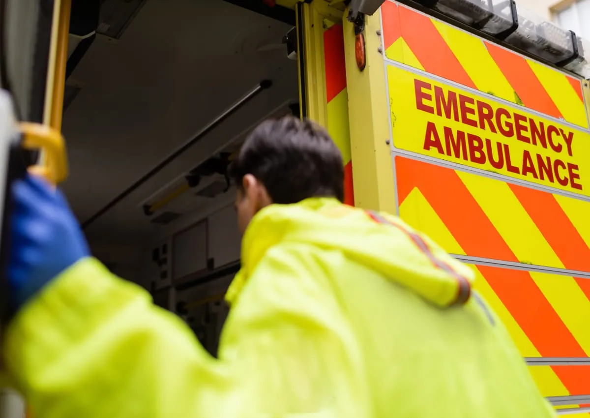 Instructor and learner beside an ambulance during C1 training